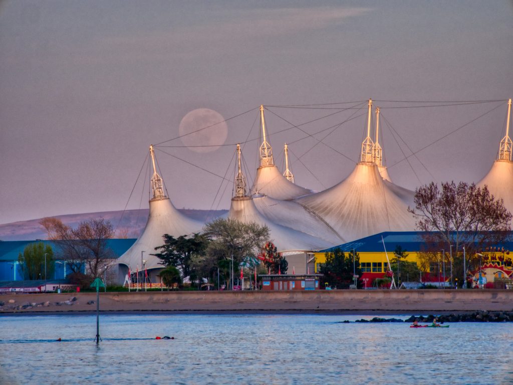 large canopy of Butlins, Minehead with full moon overhead