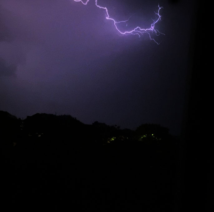 Lightning strikes over the night sky