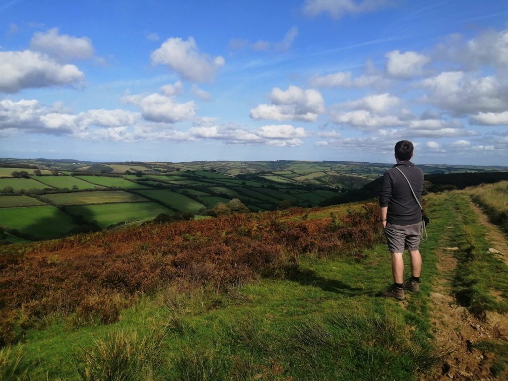 A man looks over Exmoor National Park