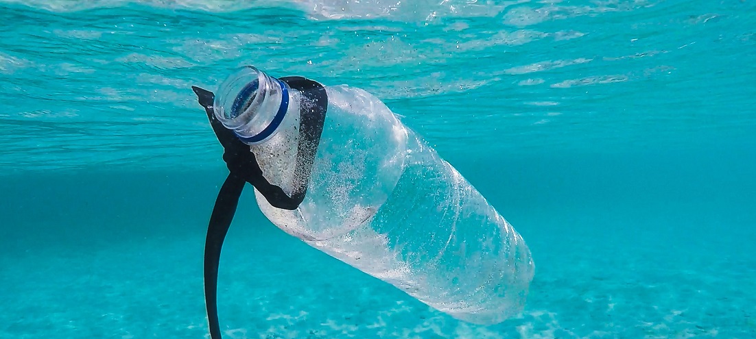 plastic bottle floating in ocean