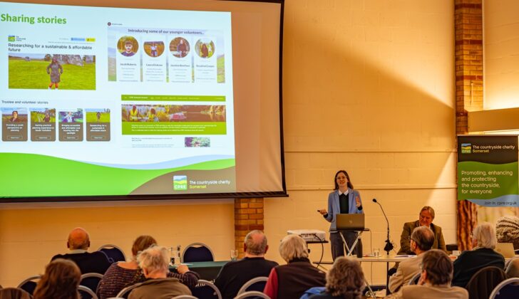 Elli Moody giving a slide presentation