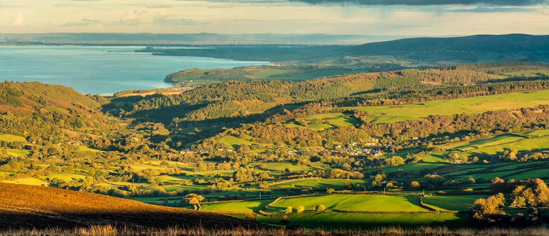 view over countryside towards the coast