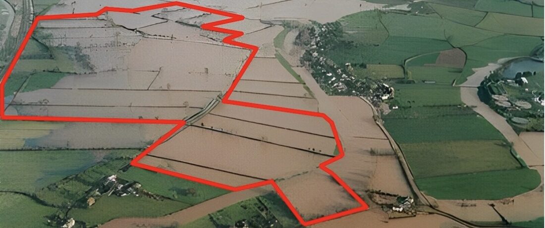 flooded land with boundary of proposed solar farm shown in red