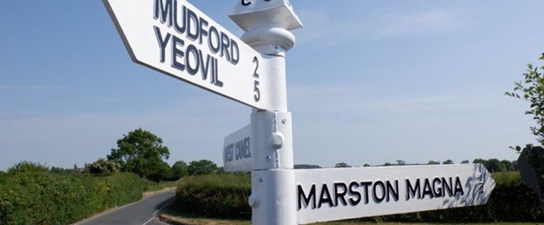 black and white fingerpost roadsign